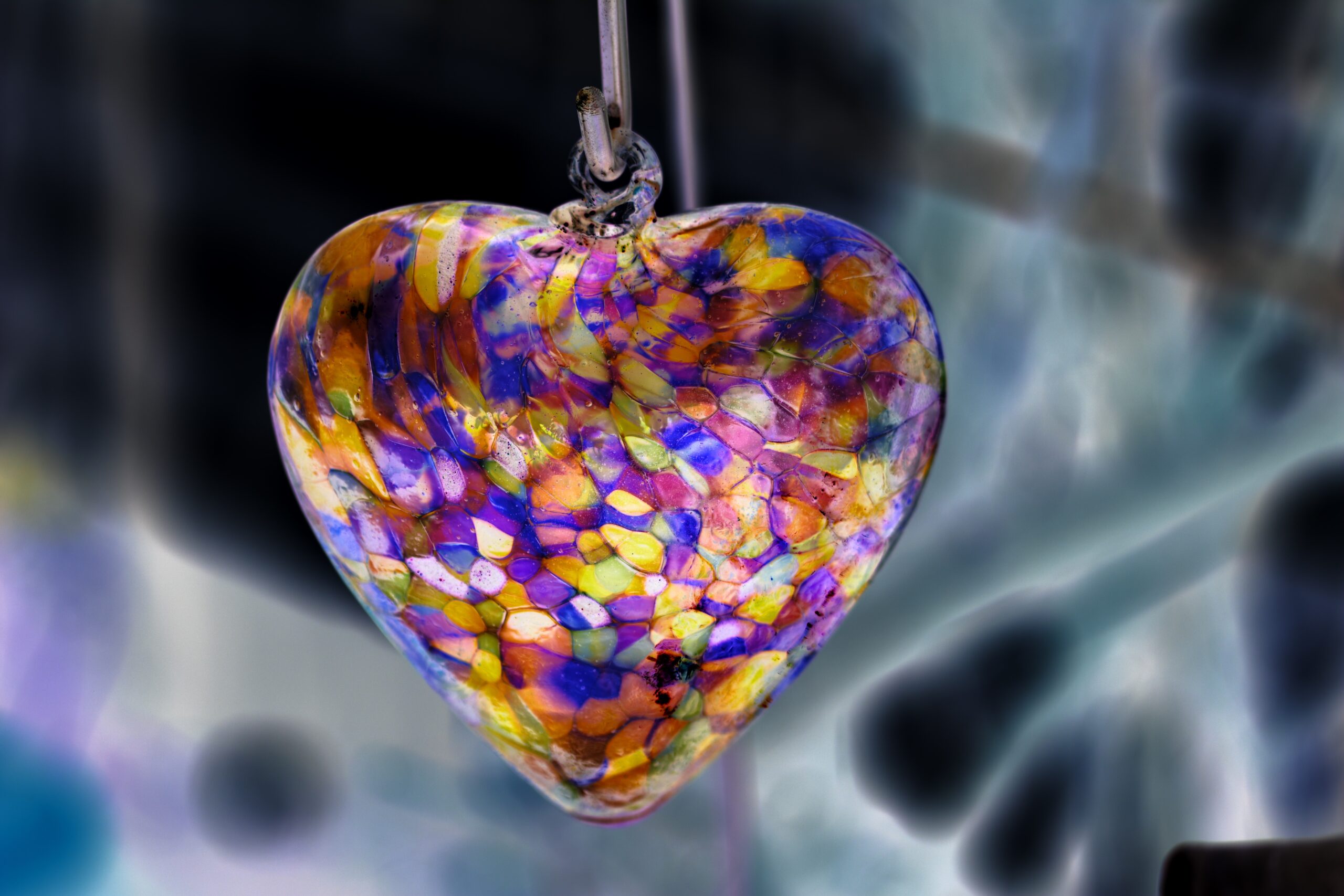 a multicolor heart pendant